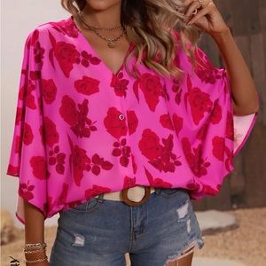 Never been worn, floral shirt.